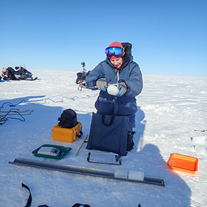 Asa Rennermalm setting up equipment in Greenland research site