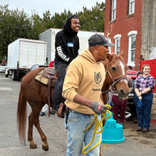 Professor Courtney Berne and students take a field-trip to the Fletcher Street Urban Riding Club.